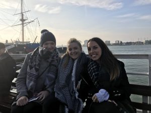 LSI/IH Portsmouth social programme organizer and students on a boat tour