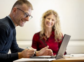 Business communication smiling with teacher 1.1